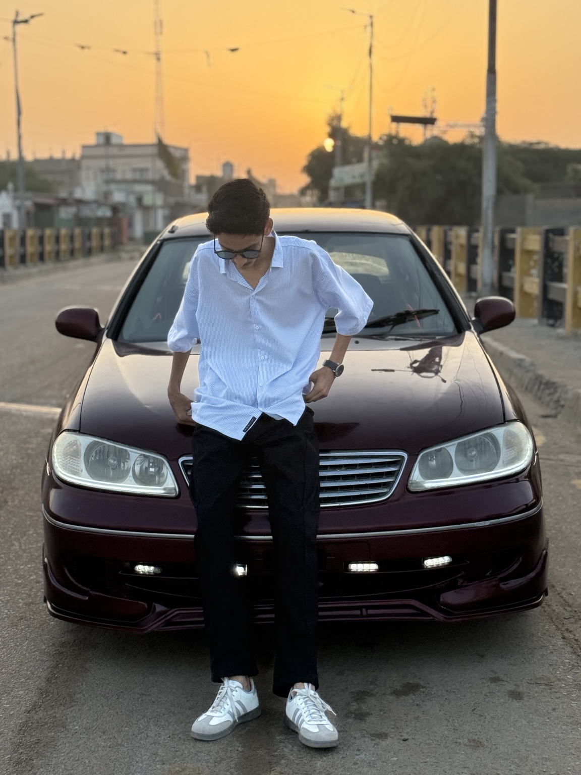 M. Ishmaan celebrating his car milestone